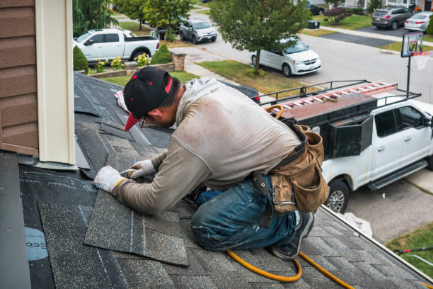 Professional Roof Repair technician working in Wheeler, IN